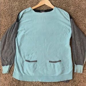 Light blue and gray plot blocked sweater